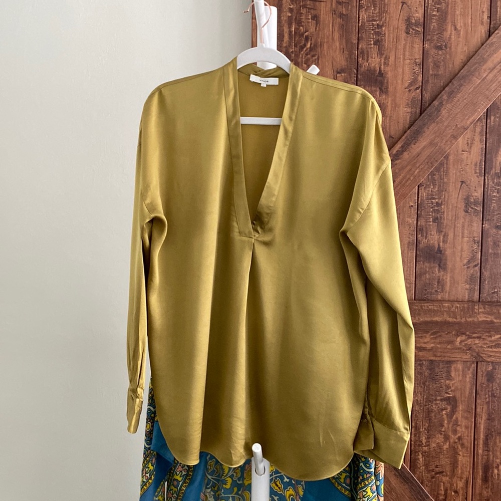 Vince 100% silk blouse . Long sleeve v neck band collar